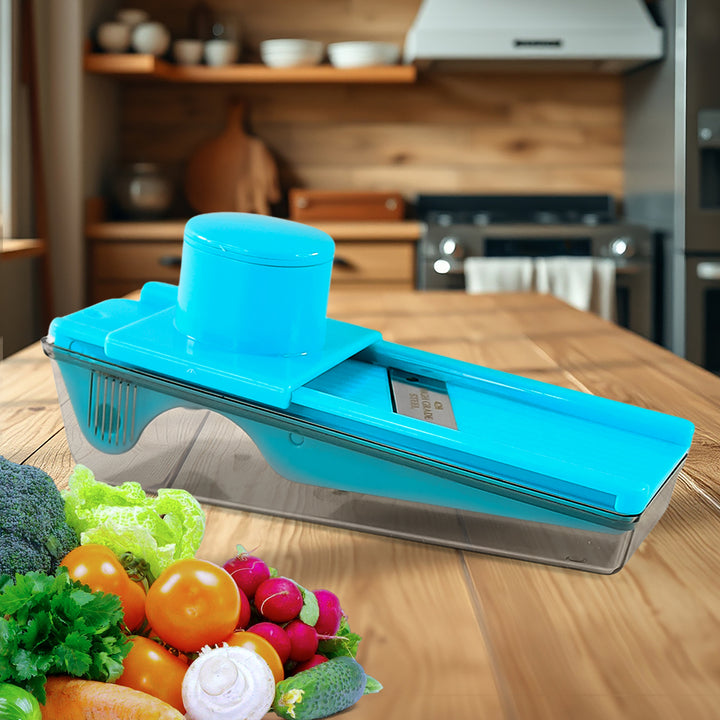 Superior eMart 2-in-1 fruit and vegetable cutter in blue with clear container on wooden kitchen table
