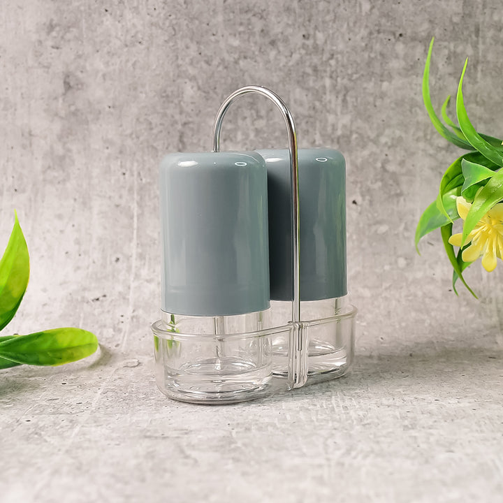 Superior eMart 2 piece seasoning dispenser set with gray lids and clear glass containers on a metal holder