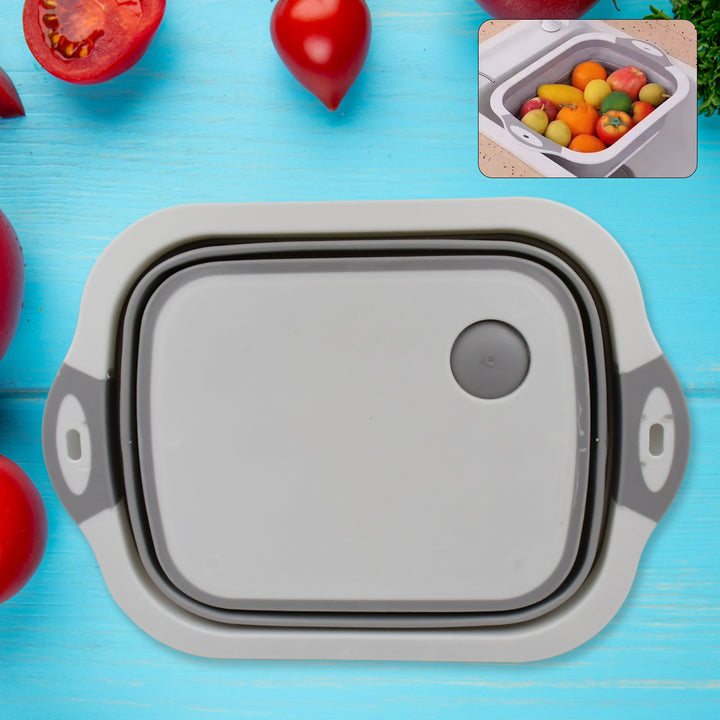 Collapsible cutting board with a dish tub basket