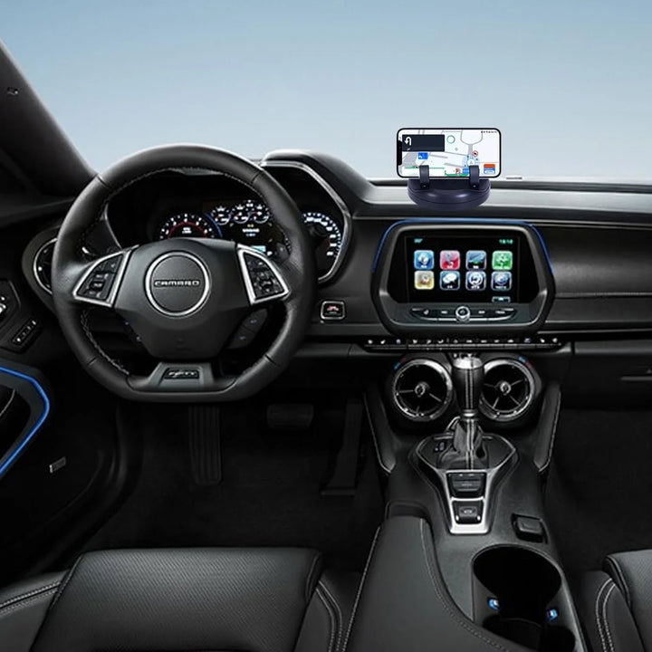 Interior view of a car showing an anti-slip car phone holder mounted on the dashboard