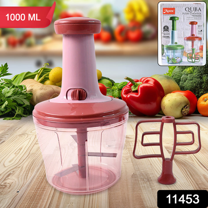 Superior eMart manual food chopper 1000ml with pink container and multiple blades on wooden kitchen table