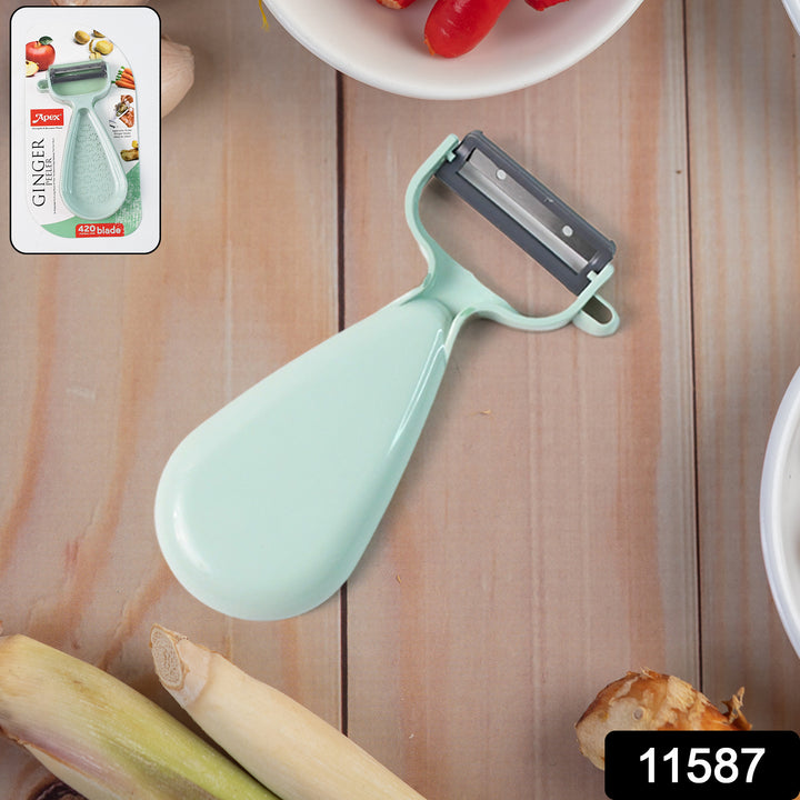 Superior eMart multipurpose ginger peeler with ergonomic handle on wooden kitchen table