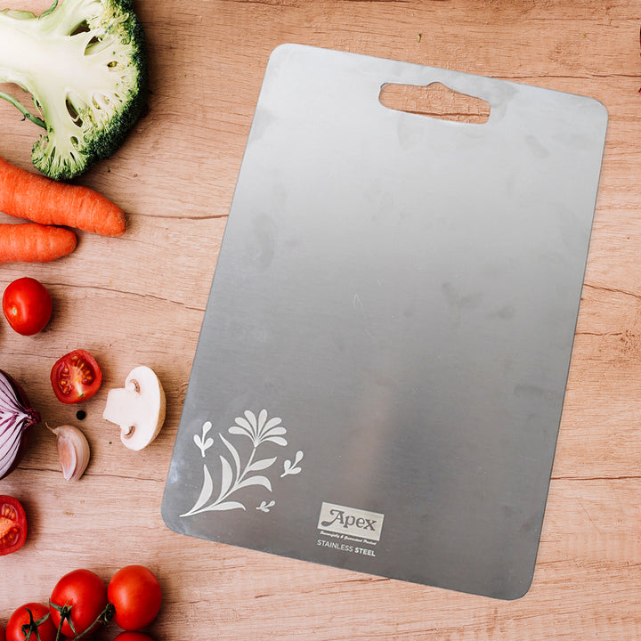 Superior eMart stainless steel medium chopping board with floral design on wooden surface with fresh vegetables