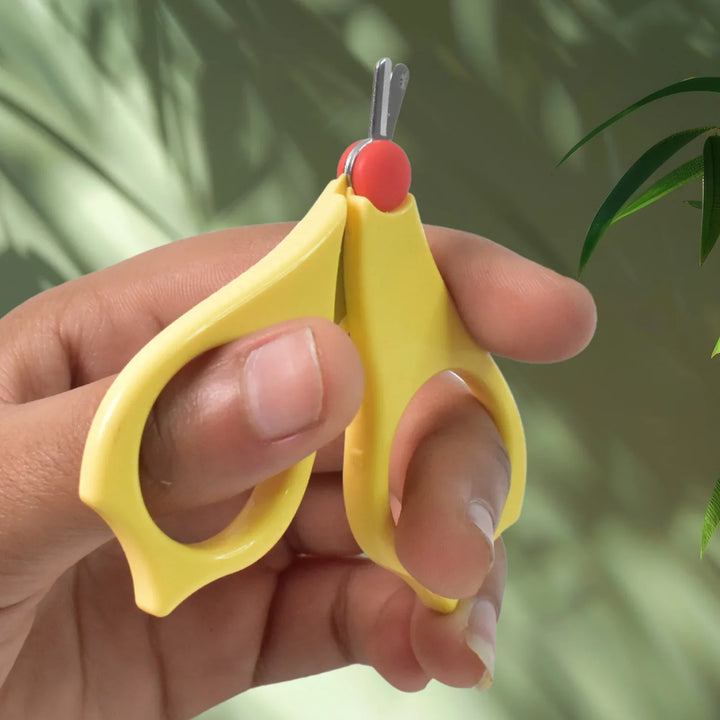Ergonomic yellow baby safety nail clippers designed for easy and safe nail care for infants