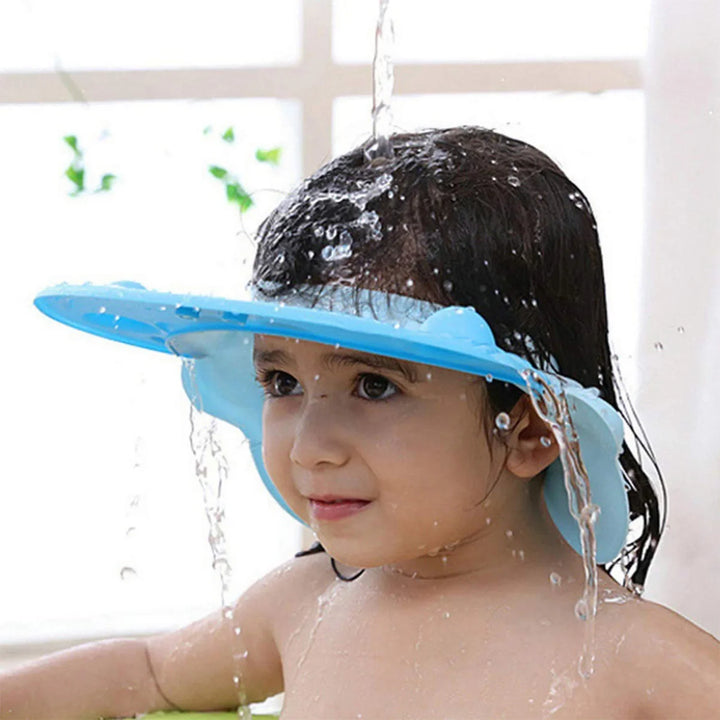 Blue baby silicone shower cap designed to keep water out of eyes during bath time for toddlers