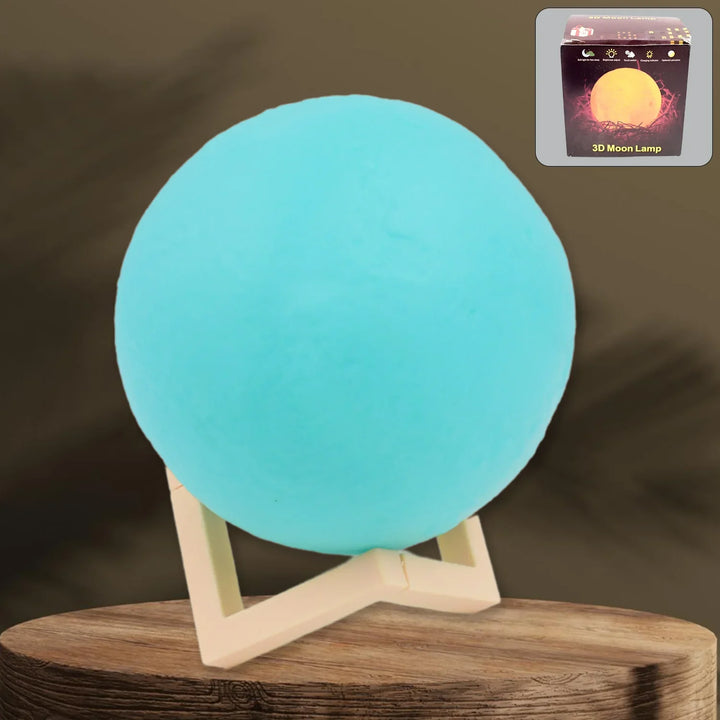 Blue moon night lamp with 3D design on a wooden stand for a calming home decor ambiance