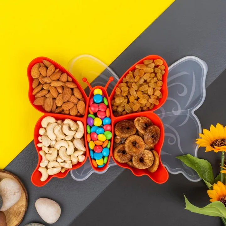 Butterfly shaped snack tray in red with compartments for nuts and candy
