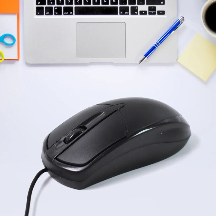 Superior eMart computer mouse M-045 in black next to a laptop on a workspace