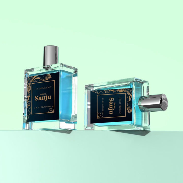 Superior eMart Desert Shadow perfume bottles inspired by Sanju perfume with blue liquid and silver caps