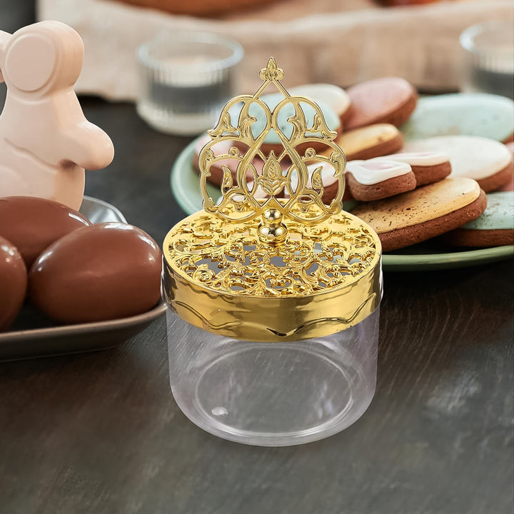 Superior eMart reusable candy box for party favors with ornate gold lid on dark table