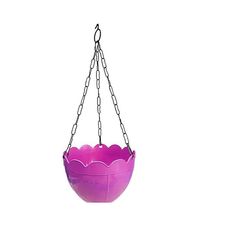 Bright pink hanging flower pot with chain for vibrant indoor and outdoor plant display