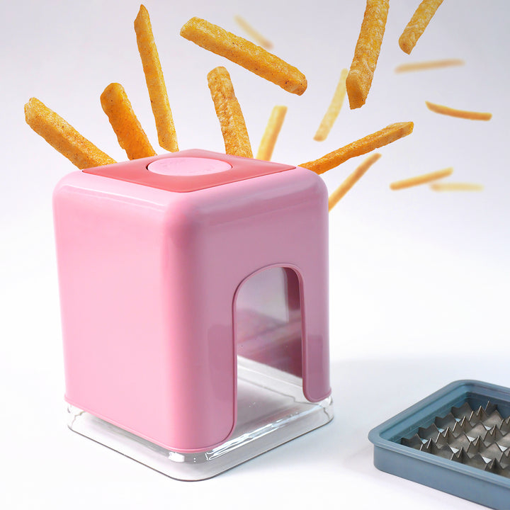 Superior eMart heavy duty potato chipper in pink with released French fries and metal blade attachment