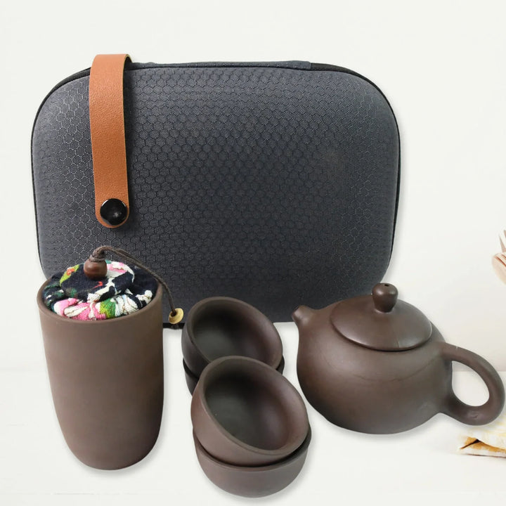 Kung Fu tea set portable with a stylish carrying case and clay tea accessories for tea enthusiasts