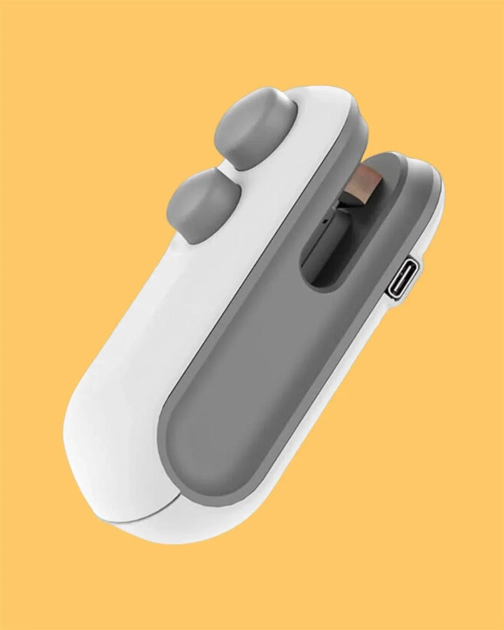Compact magnetic heat sealer with cutter in white and gray for easy bag sealing