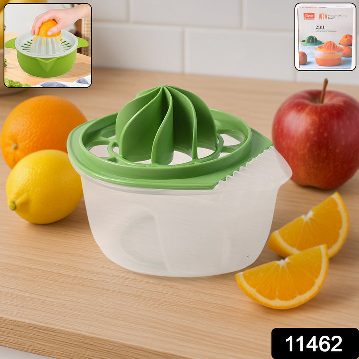 Superior eMart manual fruit juicer with seed separator in green and white on wooden countertop with fruit