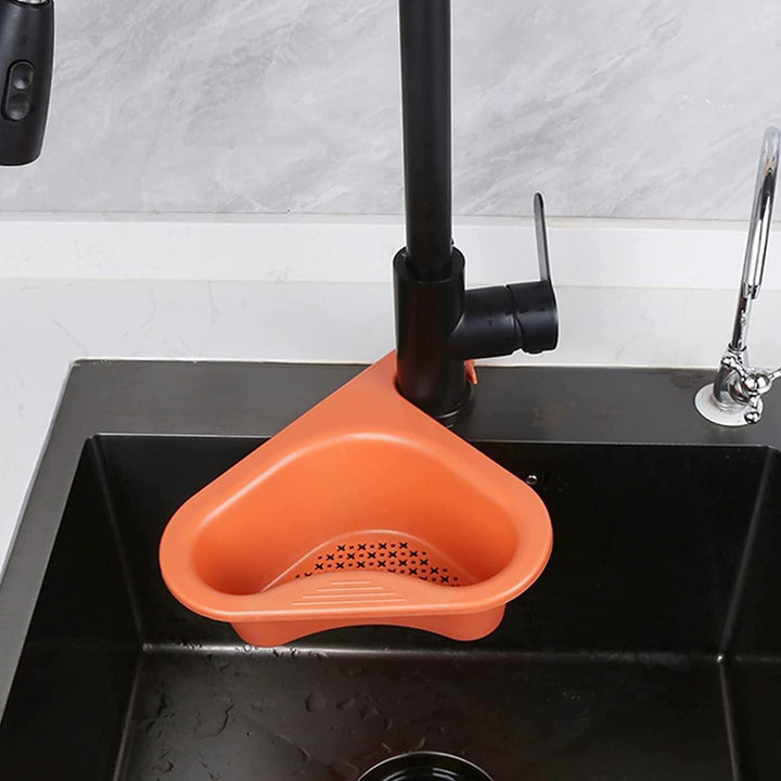 Orange multipurpose sink organizer pack of 2 corner basket attached to black kitchen sink faucet