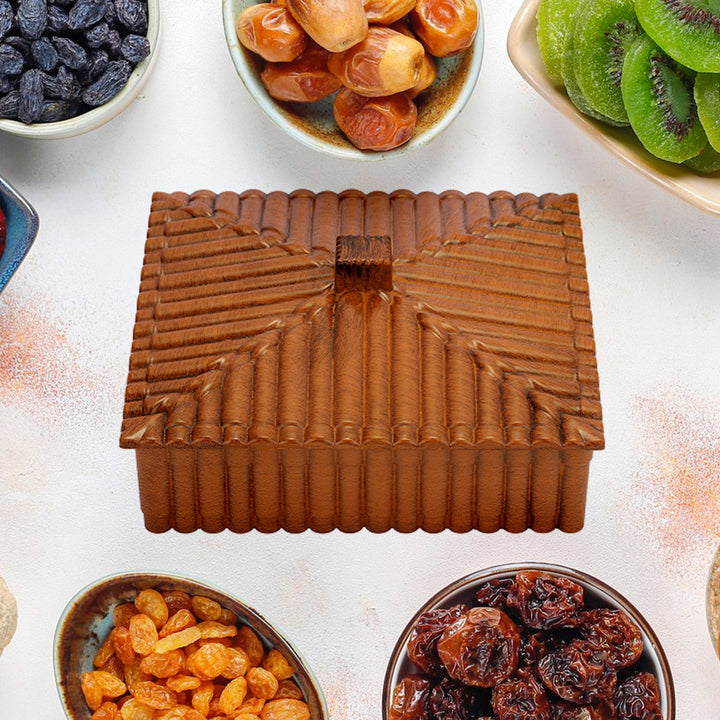 Multipurpose snack organizer in brown wood design with various dried fruits around it