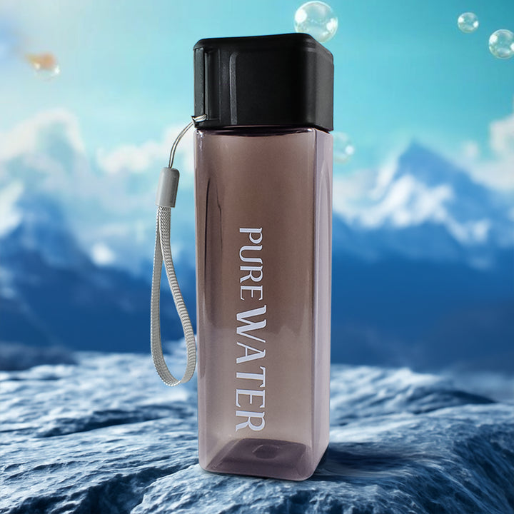 450ml square water bottle with black lid and wrist strap by Superior eMart on rocky surface