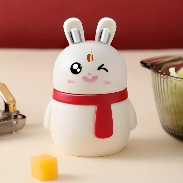 Cute rabbit-shaped toothpick dispenser with a playful design and red scarf for stylish home decor