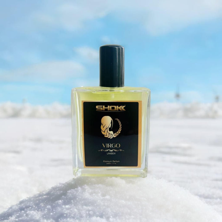 Virgo Zodiac Unisex Perfum 50ml by Superior eMart in clear glass bottle with black cap on snow background