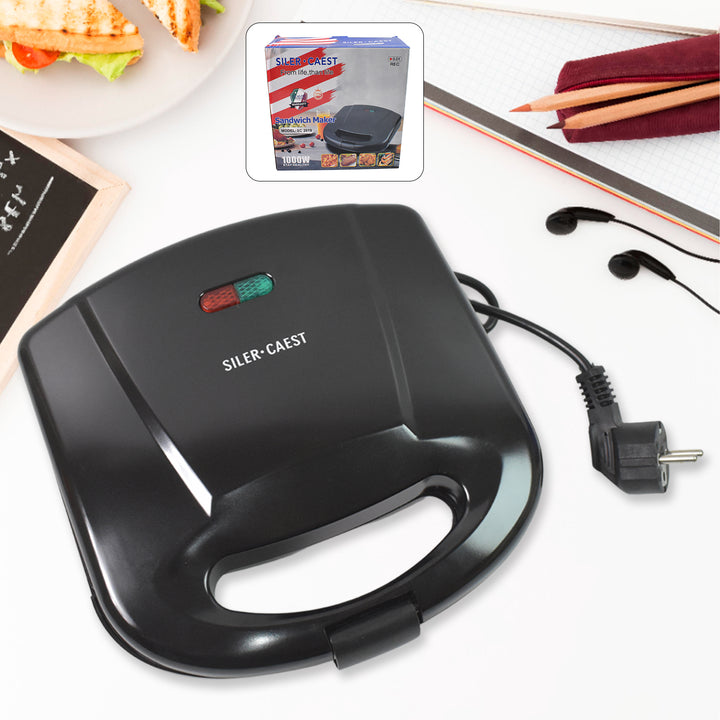 Superior eMart black sandwich maker with indicator lights on white kitchen counter