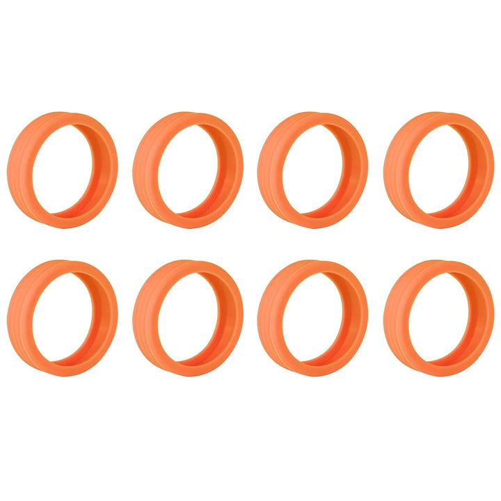Set of eight orange silicone luggage wheel covers for protecting suitcase wheels during travel