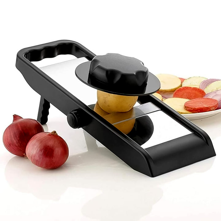 Superior eMart stainless steel potato slicer in black with handle and potato resting on slicing platform