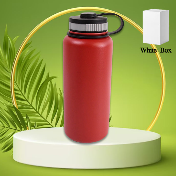 Superior eMart red stainless steel vacuum bottle 1000ml with black lid on green background