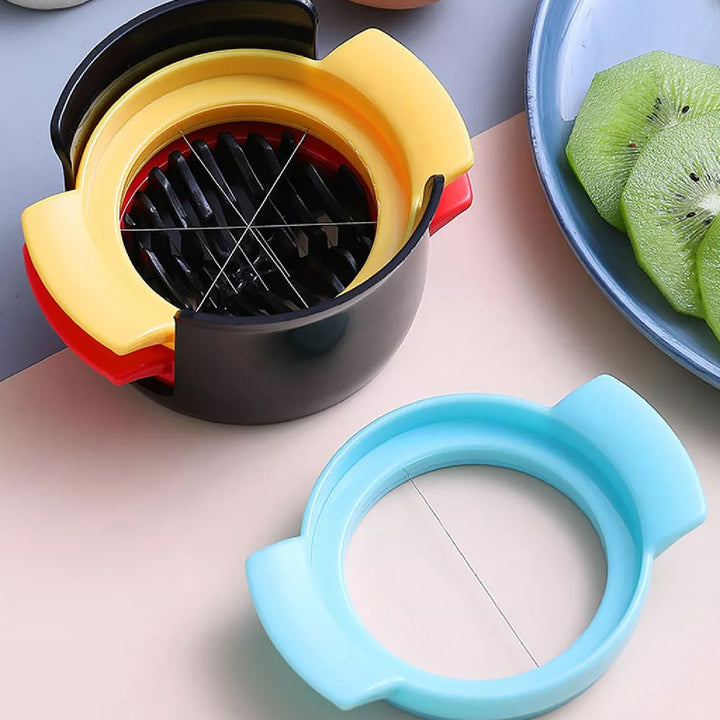Superior eMart 3 in 1 stainless steel cutter with colorful plastic frame and kiwi slices on blue plate
