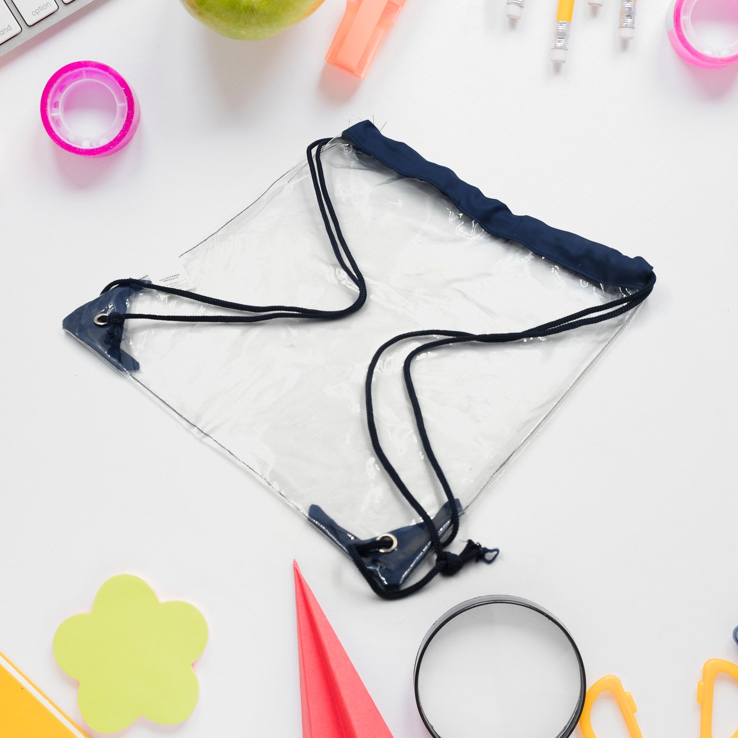 Waterproof plastic pouch with string closure, suitable for travel and sports.