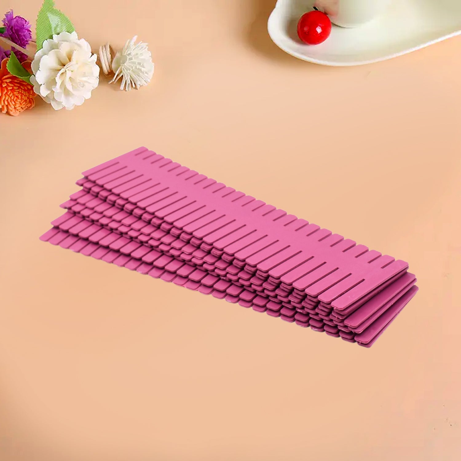 Plastic grid drawer dividers, adjustable for custom organization in home and kitchen drawers.