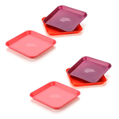 Variety of colorful square plastic plates.