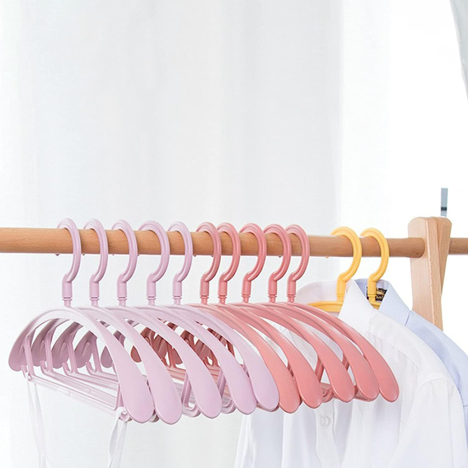 Sleek plastic hangers for clothing