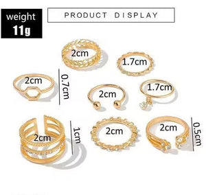 Gold rings displayed with measurements on a white background