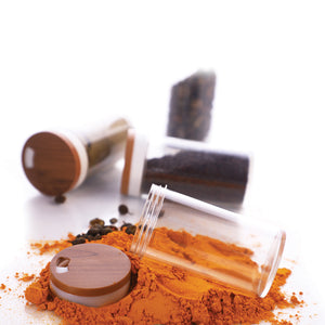 12-jar spice organizer featuring clear jars with wooden lids for efficient kitchen storage
