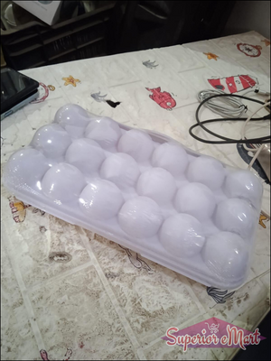 Clear 18 grid egg holder for fridge designed to keep eggs organized and fresh