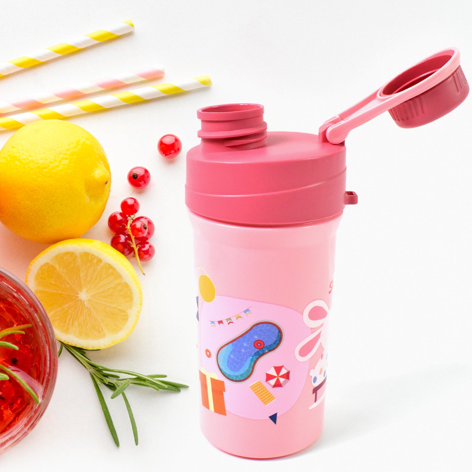 Stylish pink bottle with playful design, perfect for a 2 compartment lunch box with bottle.