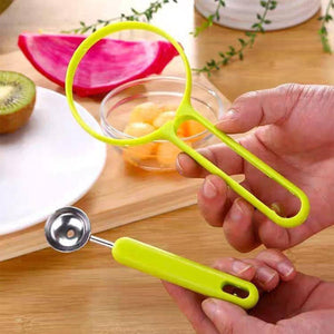 Bright green 2-in-1 fruit peeler and baller for easy fruit preparation in the kitchen