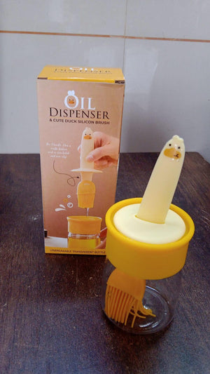 Cute 2 in 1 oil dispenser with basting brush in yellow packaging for kitchen use