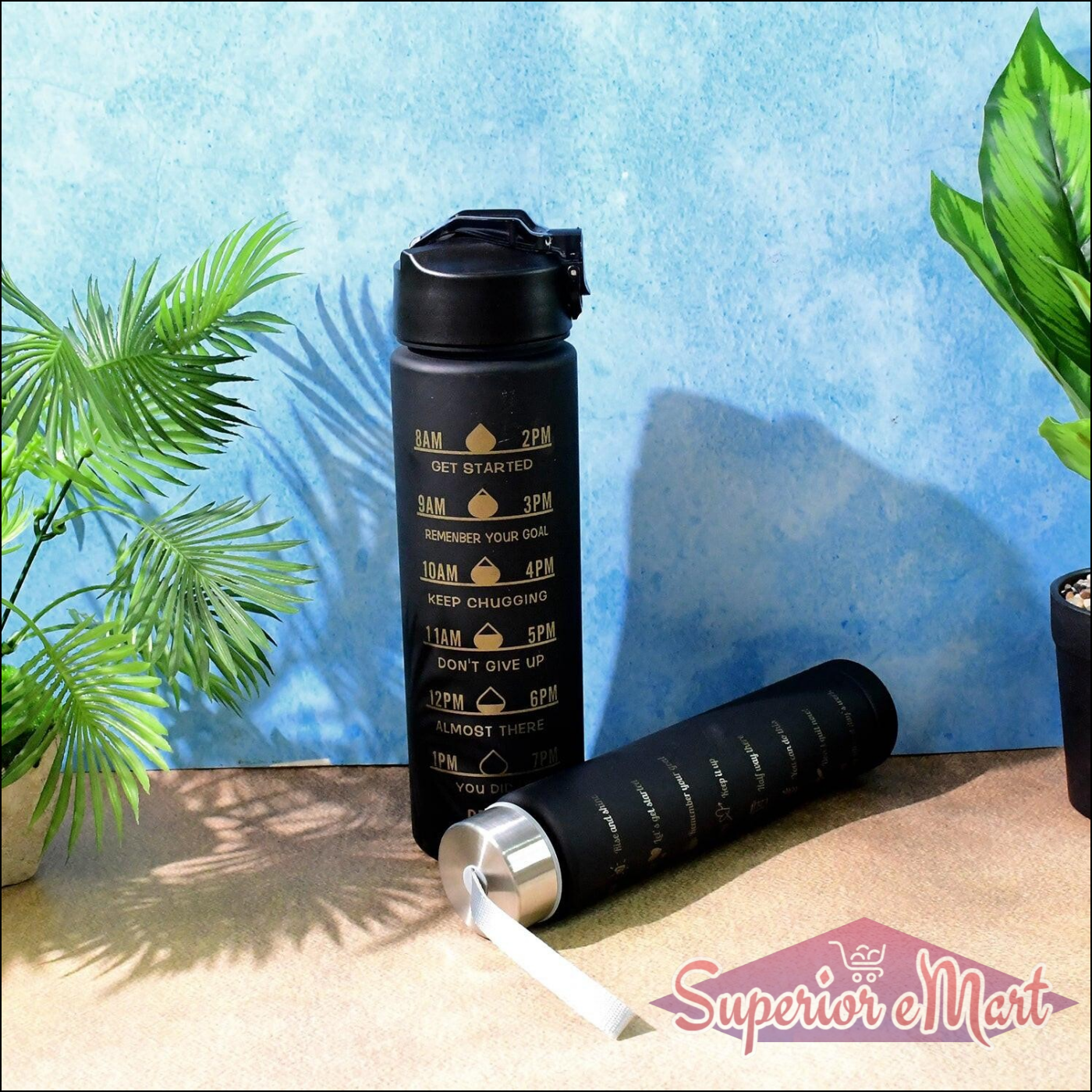 Motivational water bottle set featuring time markers for hydration reminders and a sleek black design