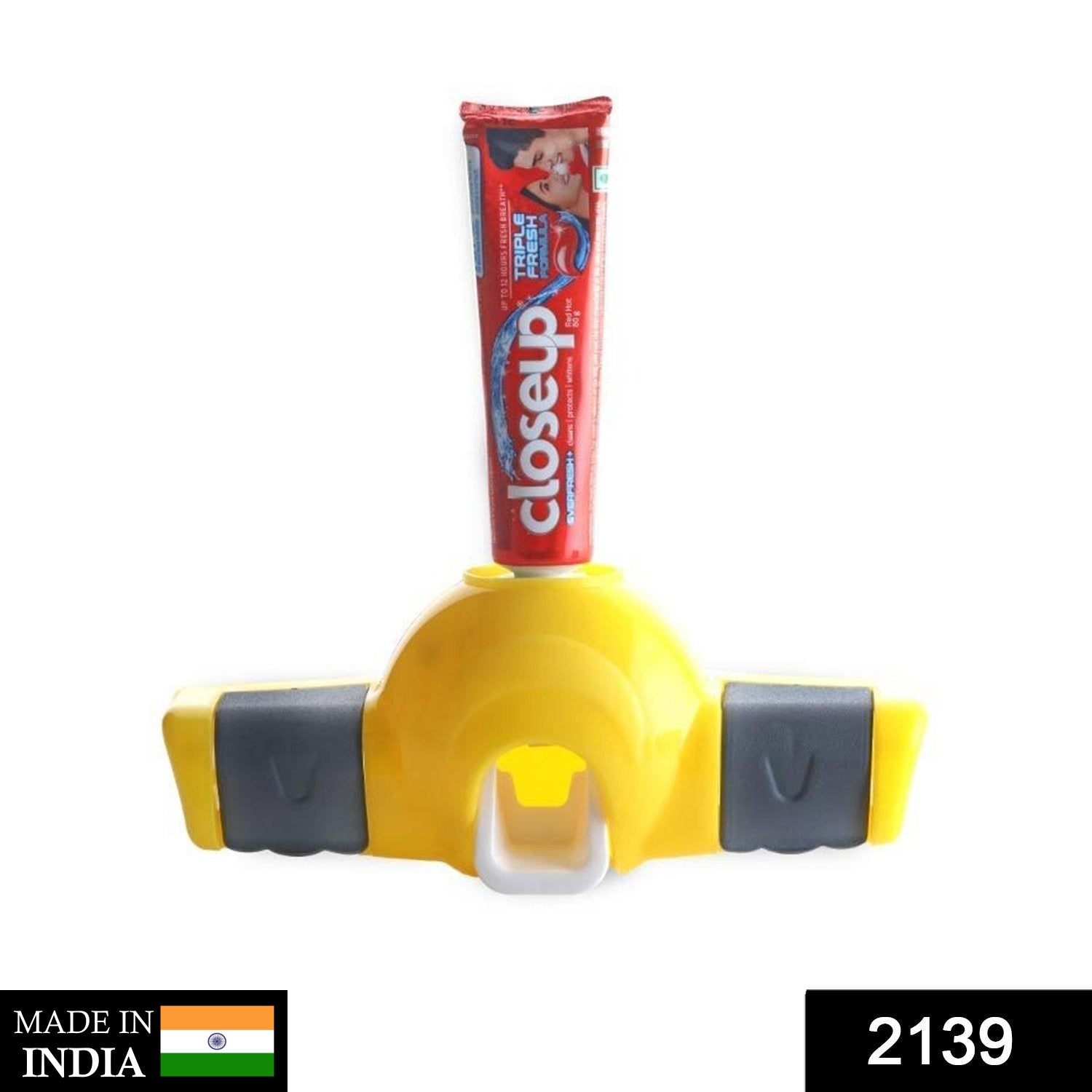 स्वचालित पुश टूथपेस्ट स्क्वीज़र डिस्पेंसर - 2139_magic_toothpaste_disp