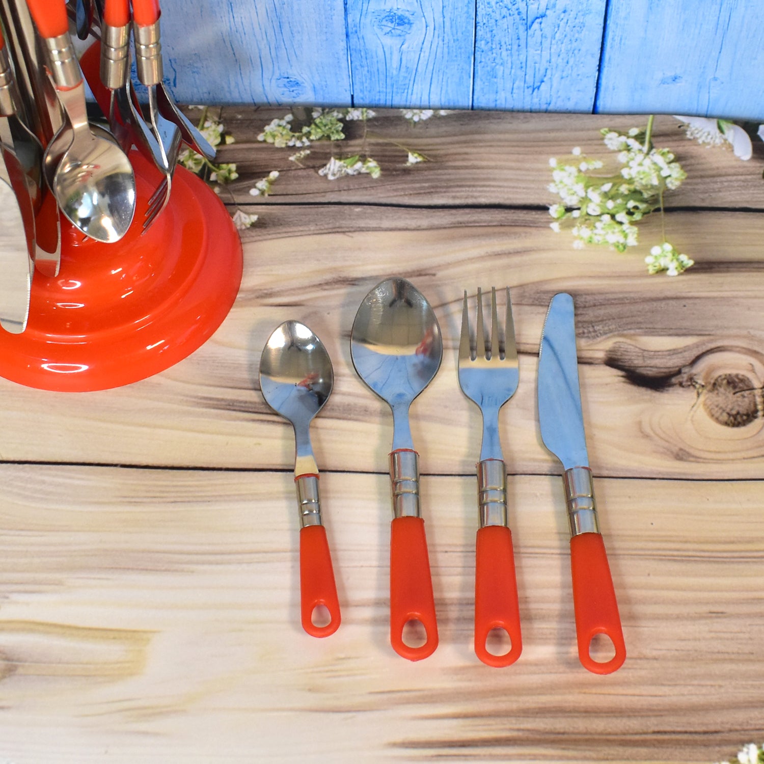 26-piece dining table cutlery set with vibrant red handles for stylish dining experiences