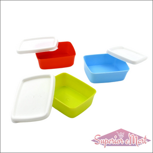 Airtight food storage containers set in red, blue, yellow, and white for efficient kitchen organization