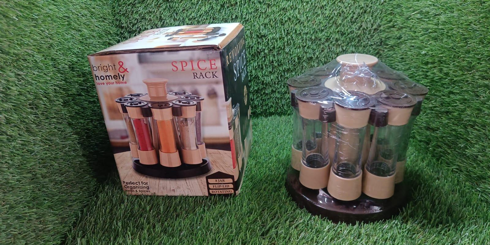 360 revolving spice rack with clear containers and a stylish base for organized storage