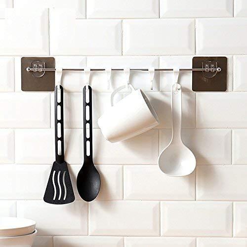 Multipurpose self-adhesive hooks, plastic, suitable for home use.