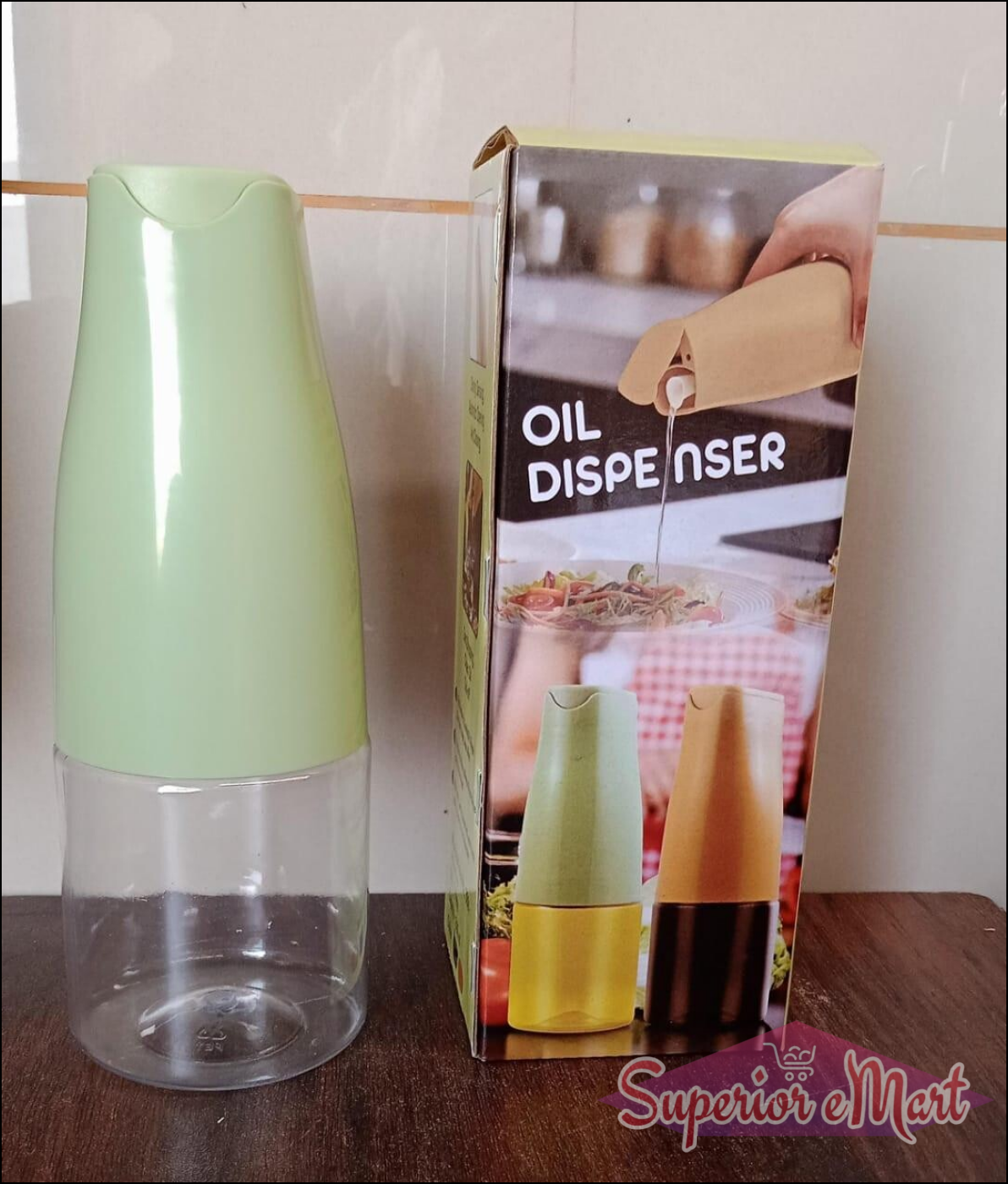 Superior eMart automatic oil dispenser for kitchen in green color with clear base and packaging