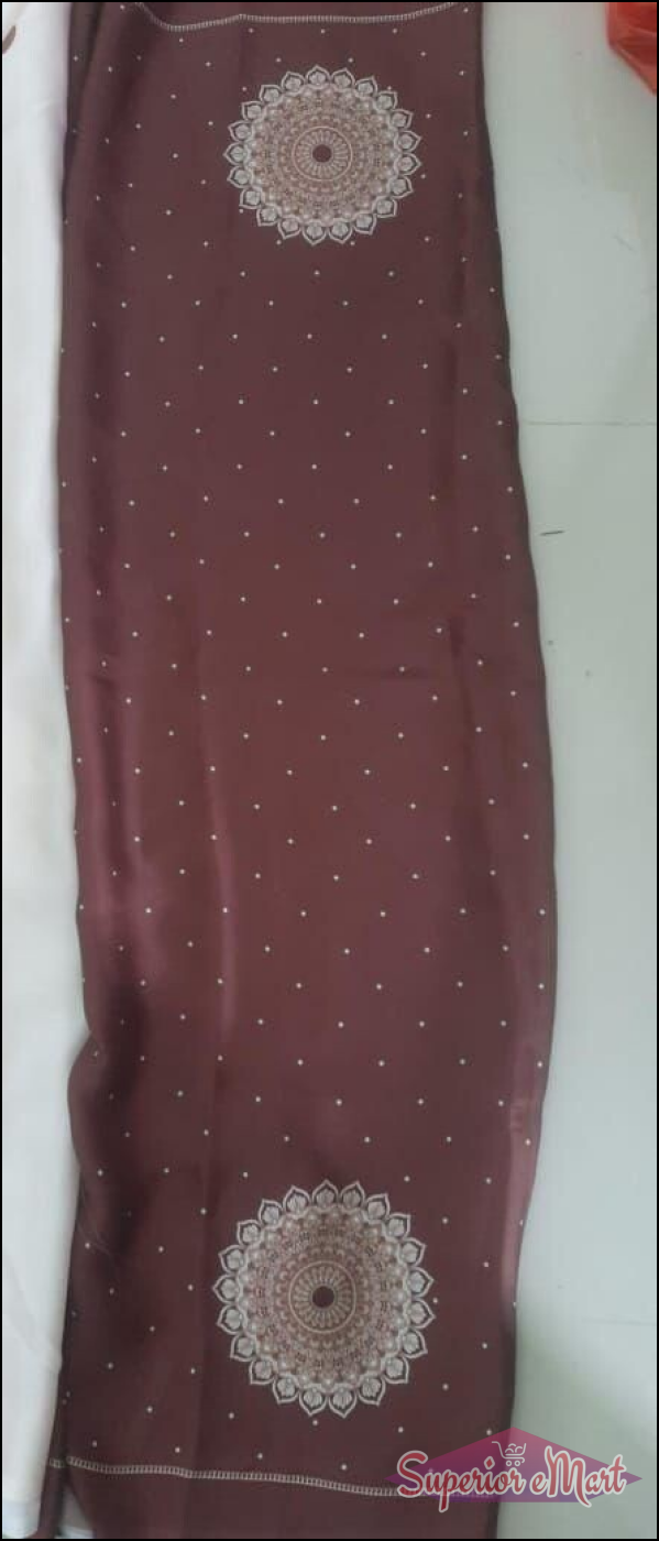 Maroon silk-style fabric with large white mandala patterns, tiny white polka dots, and a decorative white border.