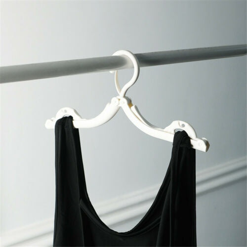 Portable plastic hanger, foldable design, suitable for travel and small closets.