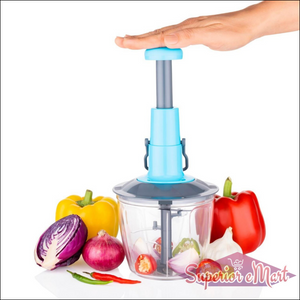 Manual vegetable chopper with a hand-operated top, chopping colorful vegetables for easy meal prep