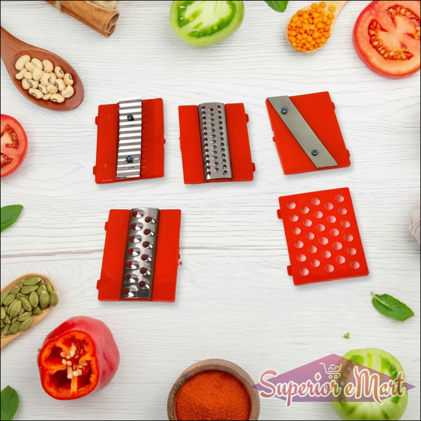 Red vegetable chopper with interchangeable blades on a white surface with vegetables around